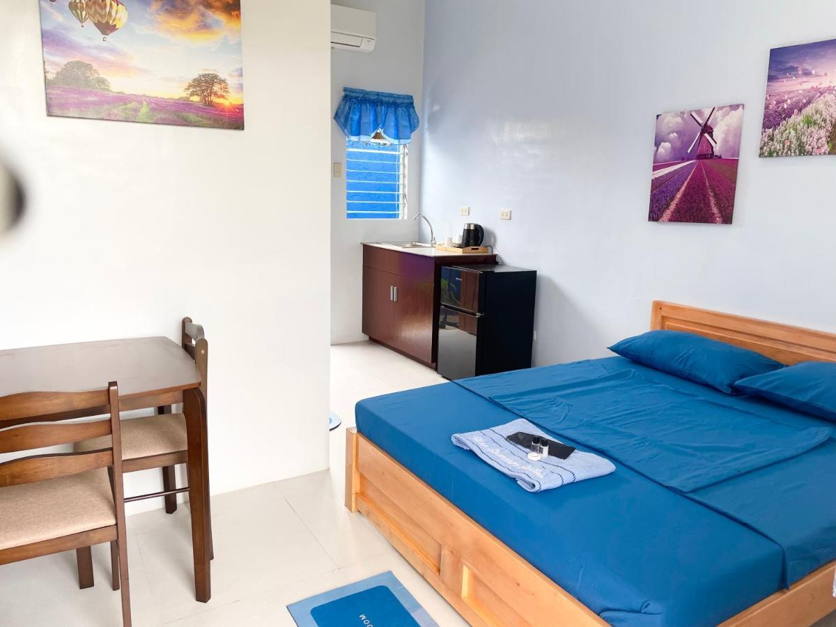 Blue Summer Suites & Restaurant Bingag ภายนอก รูปภาพ