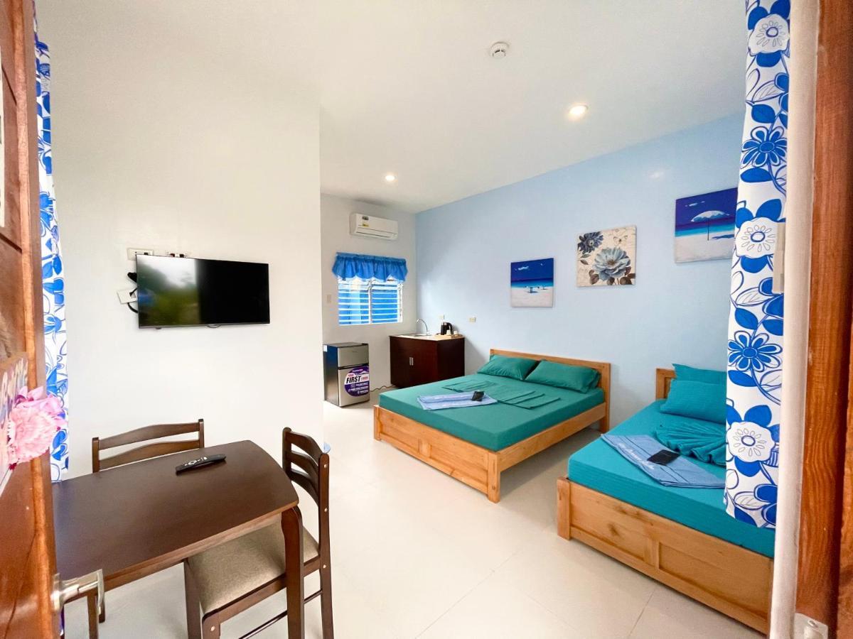 Blue Summer Suites & Restaurant Bingag ภายนอก รูปภาพ