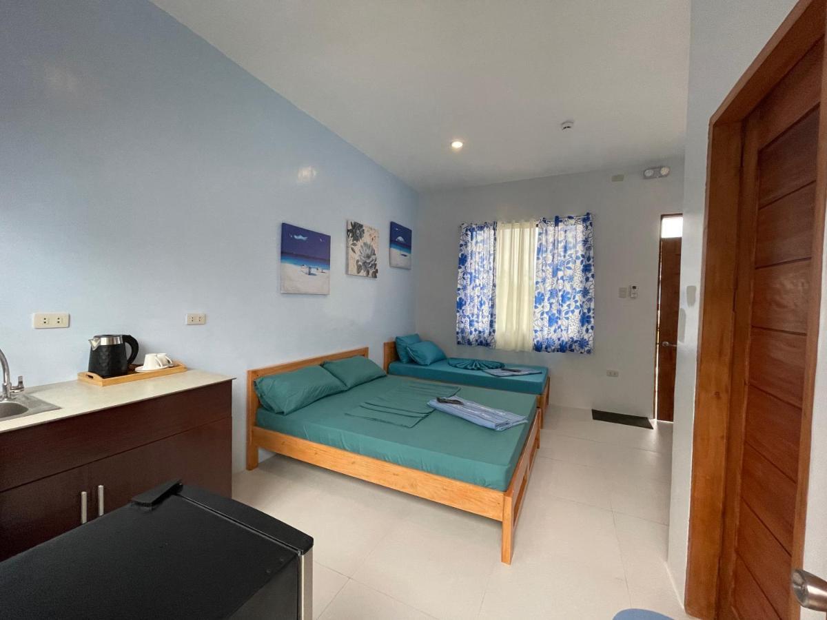 Blue Summer Suites & Restaurant Bingag ภายนอก รูปภาพ