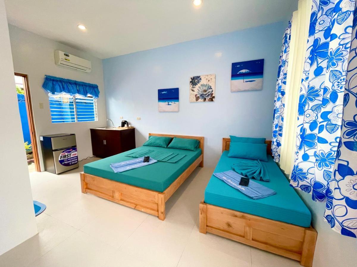 Blue Summer Suites & Restaurant Bingag ภายนอก รูปภาพ