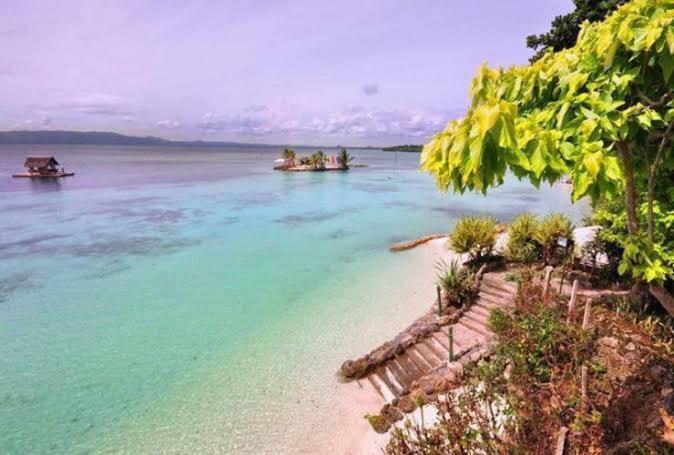Blue Summer Suites & Restaurant Bingag ภายนอก รูปภาพ